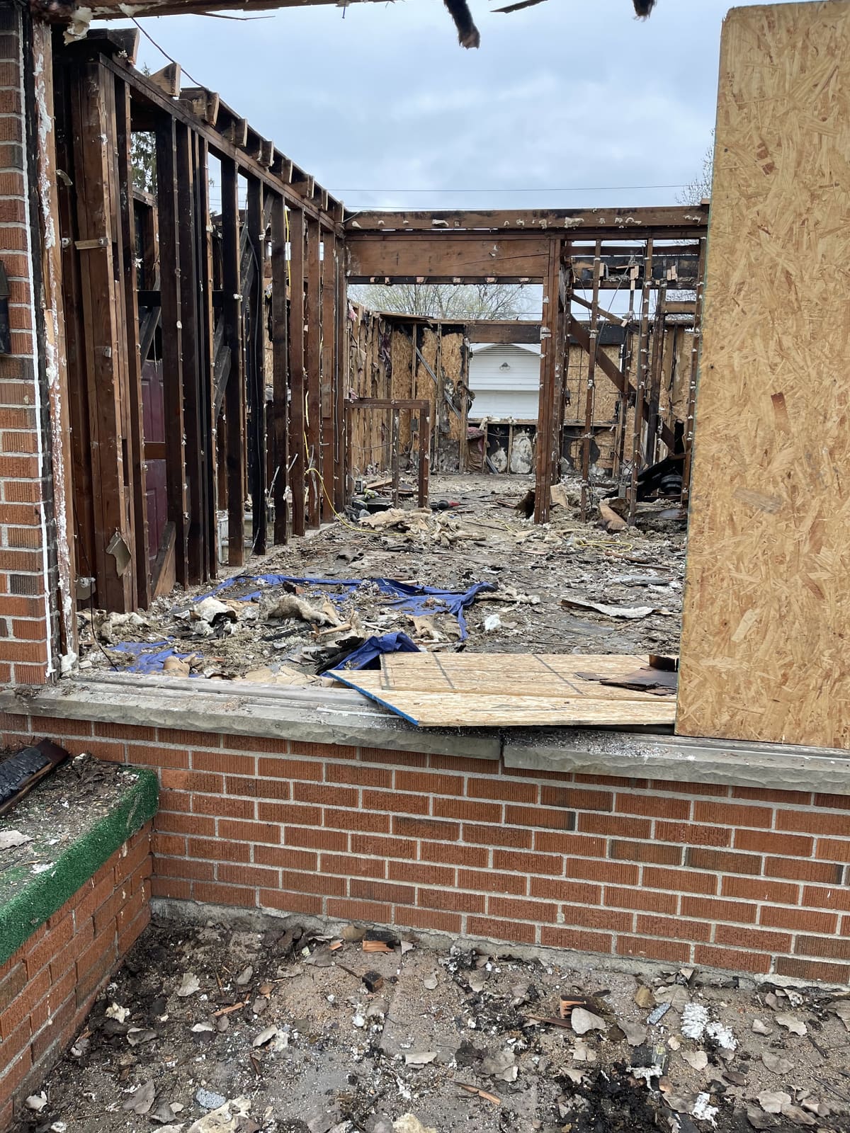 Brick building interior gutted down to the floor joists