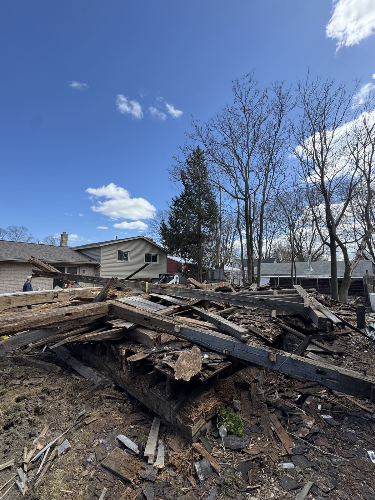 Pile of lumber and debris after a structure was taken down