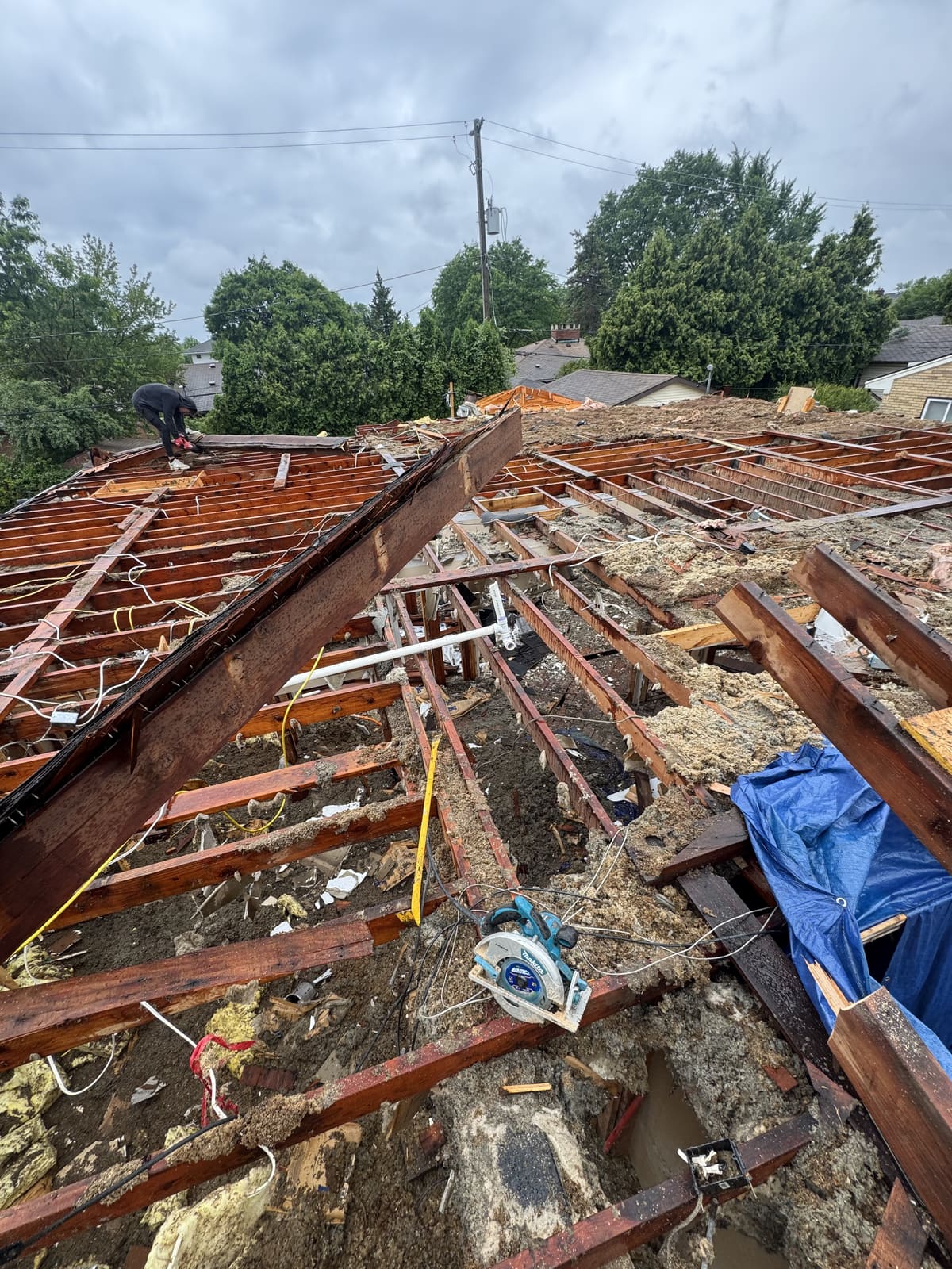 Roof framing exposed after the roofing was stripped off