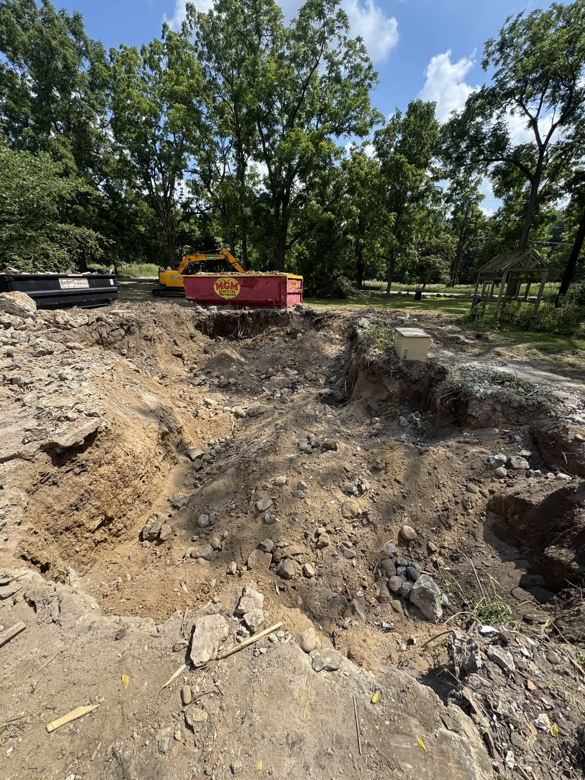 Cleared excavation where a structure was removed